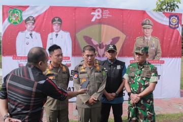 Satuan Polisi Pamong Praja (Satpol-PP) Kota Medan Menggelar Acara Yang Diisi Dengan Berbagai Kegiatan di Lapangan Cadika, Medan Johor, Jumat (18/8)