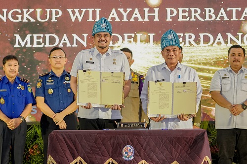 Pemko Medan dan Pemkab Deliserdang Melakukan Penguatan Hubungan Kerja Sama di Gedung Pertemuan Pemkab Deliserdang Jalan Medan - Lubuk Pakam, Rabu (28/12).