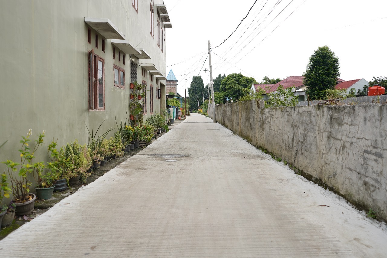 Jalan Pintu Air IV Gg. Sim-Sim Selesai Diperbaiki, Aktifitas Warga Semakin Lancar